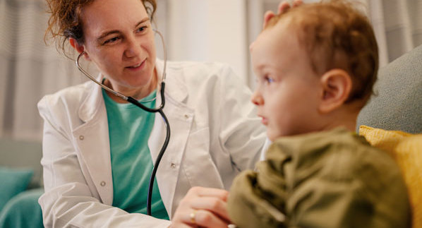 Child with a pediatrician in a doctor's office